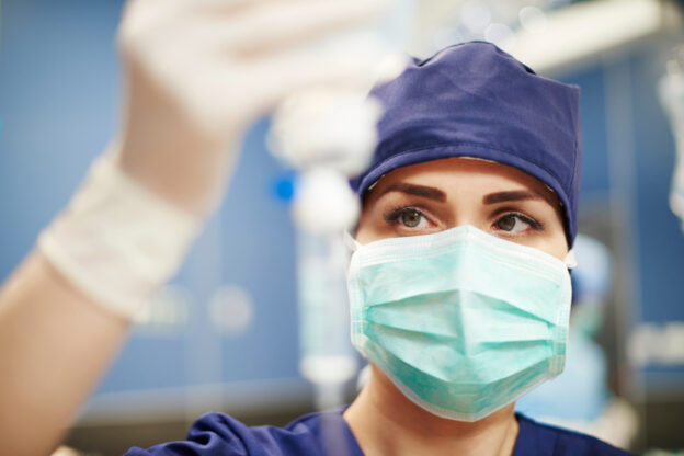 Female board-certified anesthesiologist during surgery